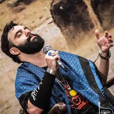 جواد مقدم چو گیسوی خود پیچ و تابم بده